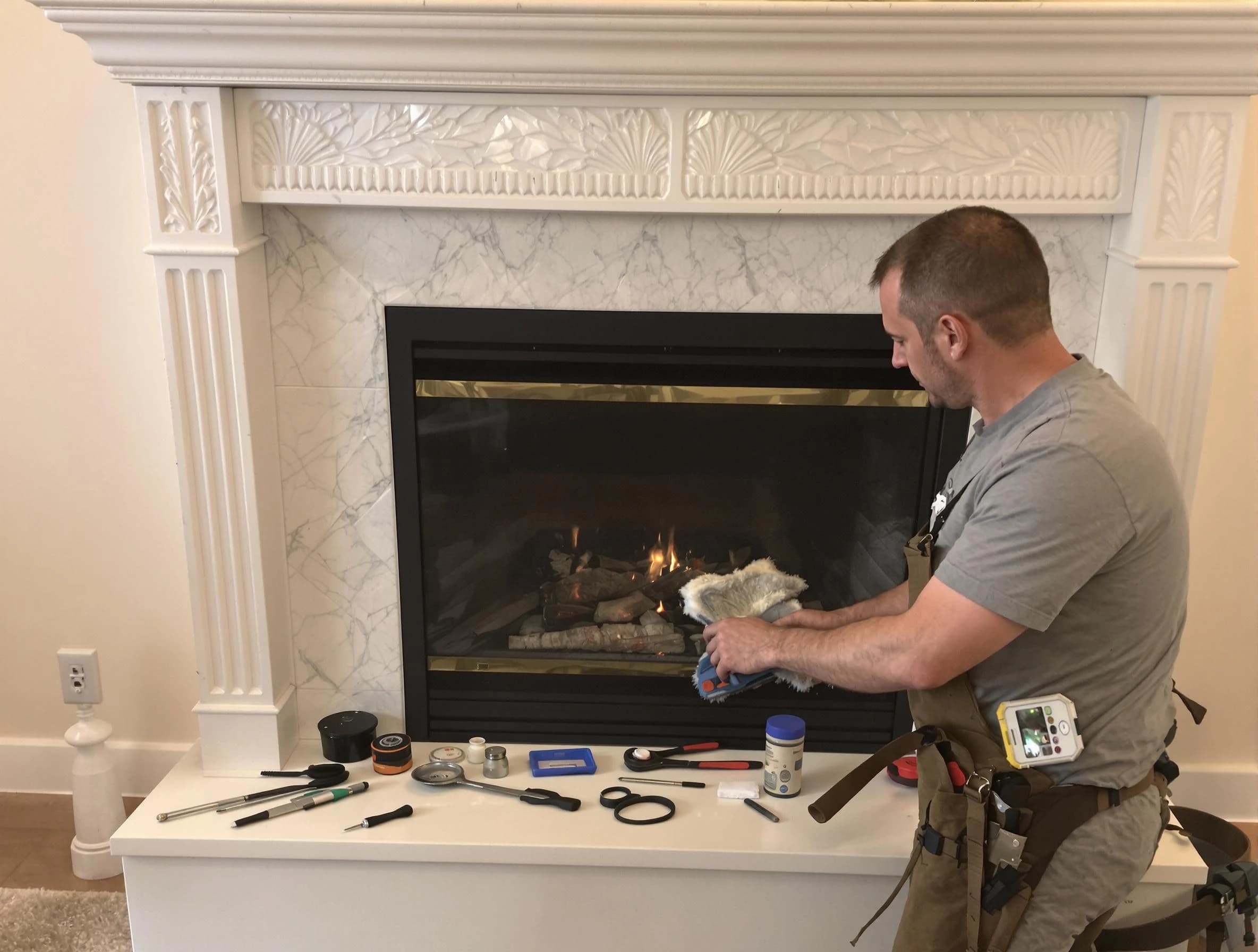 Avondale Estates Chimney Sweep performing fireplace maintenance in Avondale Estates, GA